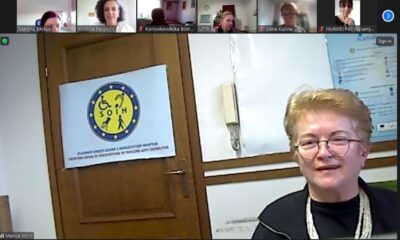 Slika prikazuje snimku online sastanka s više sudionika čija su imena vidljiva, ali lica su zamagljena ili nisu vidljiva.