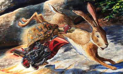 Ova slika prikazuje zeca koji trči i kornjaču koja leti pomoću mlaznog motora. Kornjača nosi kacigu i ima raketni pogon pričvršćen za leđa, dok zec izgleda iznenađeno.