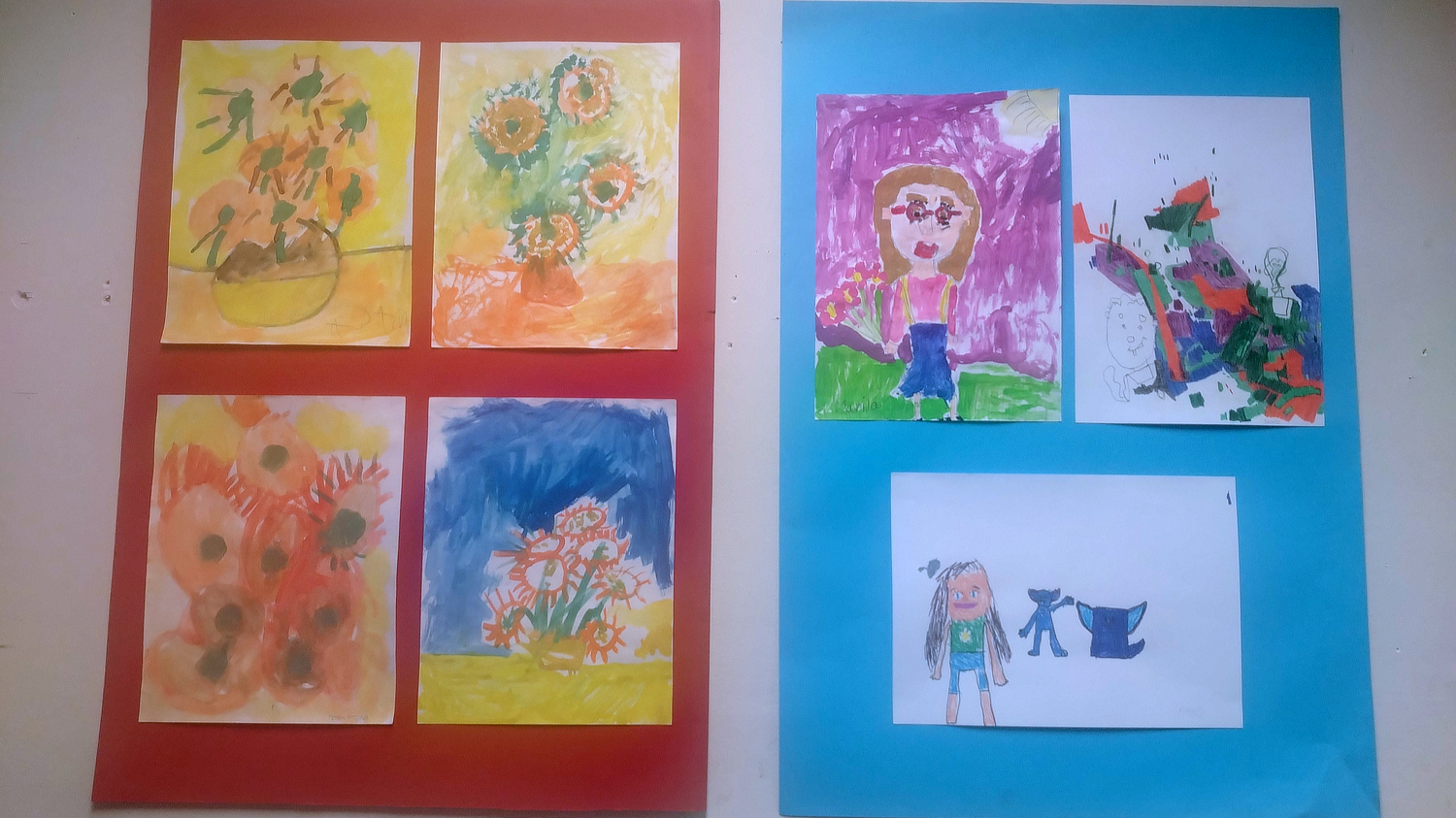 Dva velika kartonska panoa – jedan crvene boje s četiri slike cvijeća u toplim tonovima, a drugi plavi s tri dječja crteža: portret djevojčice s cvijećem, apstraktni crtež u zelenoj, crvenoj i ljubičastoj boji te crtež djevojčice i dvije životinje. Svi radovi izrađeni su dječjom rukom, jednostavni i izražajni, s jakim bojama i iskrenim prikazima.