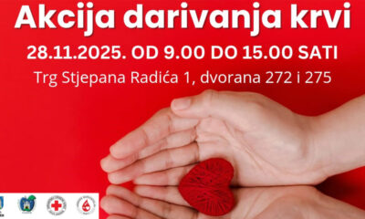 Promotivna grafika za akciju darivanja krvi na jarko crvenoj pozadini. Na vrhu velikim bijelim slovima piše “Akcija darivanja krvi”, a ispod “28.11.2025. od 9.00 do 15.00 sati” te “Trg Stjepana Radića 1, dvorana 272 i 275”. U donjem dijelu slike prikazane su dvije otvorene ljudske ruke koje drže malo crveno srce napravljeno od pređe. U donjem lijevom kutu nalaze se logotipi Grada Zagreba, Gradskog ureda za zdravstvo, Crvenog križa i Kluba darivatelja krvi.