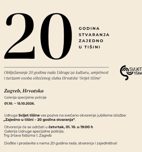 Na fotografiji je prikazan promotivni plakat Udruge za kulturu, umjetnost i turizam osoba oštećenog sluha Hrvatske „Svijet tišine“, kojim se najavljuje obilježavanje 20 godina rada Udruge. Plakat je minimalistički oblikovan na svijetloj, bež podlozi. U gornjem dijelu dominira veliki crni broj „20“, uz koji stoji poruka „GODINA STVARANJA ZAJEDNO U TIŠINI“. Ispod je navedeno da se obilježava 20 godina rada Udruge „Svijet tišine“. U središnjem dijelu istaknuta je informacija o održavanju izložbe u Zagrebu, u Galeriji Specijalne policije, od 1. do 15. listopada 2026. godine. Posebno je najavljeno svečano otvorenje izložbe „Zajedno u tišini – 20 godina stvaranja“, koje će se održati u četvrtak, 1. listopada u 19 sati, na adresi Trg žrtava fašizma 1 u Zagrebu. U donjem dijelu plakata nalazi se poziv građanima da se pridruže obilježavanju i proslave 20 godina rada, stvaranja i zajedništva. Na desnoj strani nalazi se prepoznatljiv logotip Udruge „Svijet tišine“.